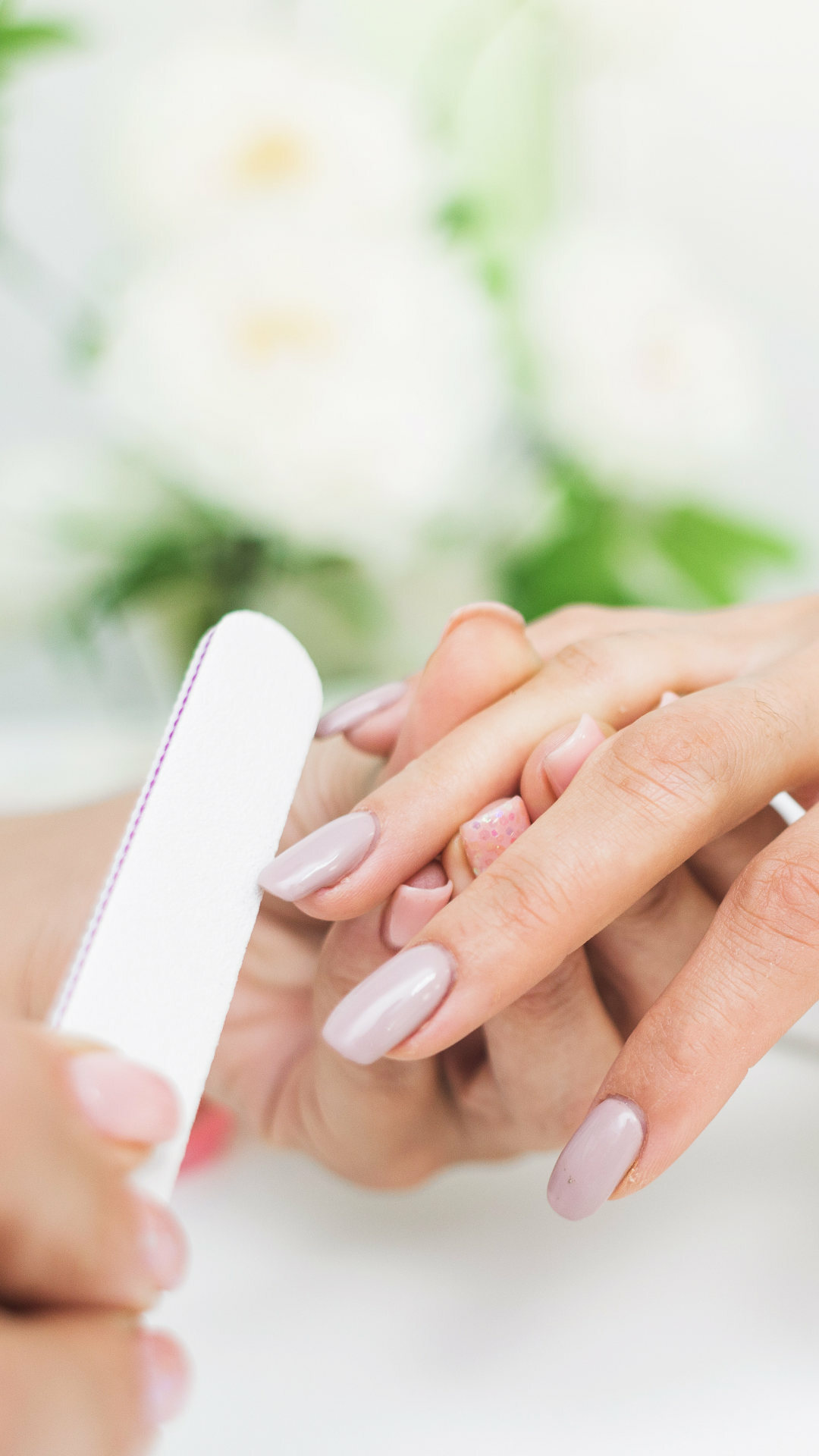 Hands being manicured